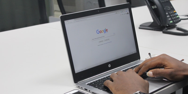 man-using-google-on-a-laptop
